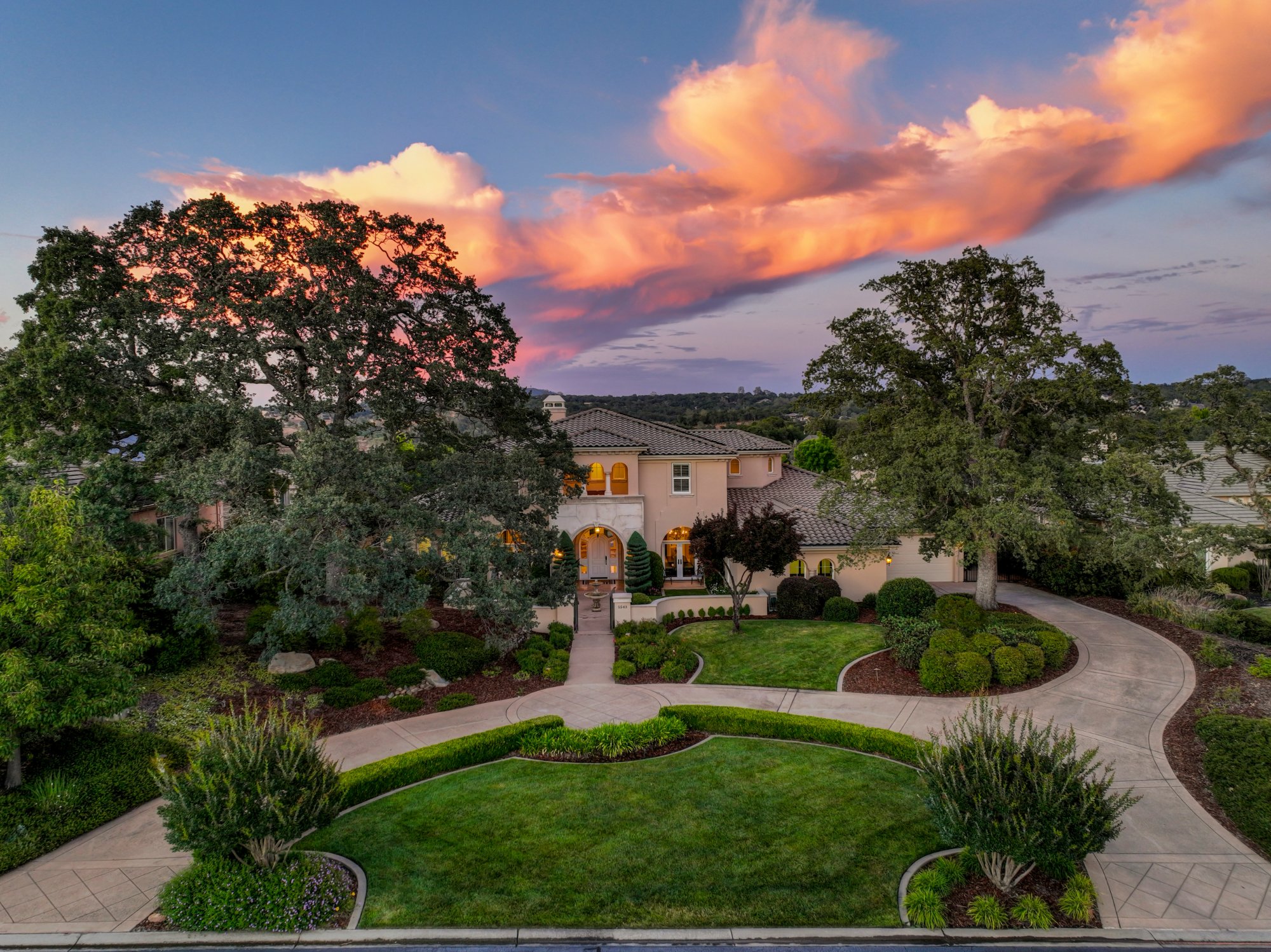 Luxury estate aerial California foothills sunset